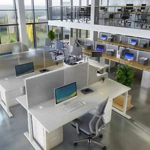 Modern open office workspace with computers and ergonomic desks