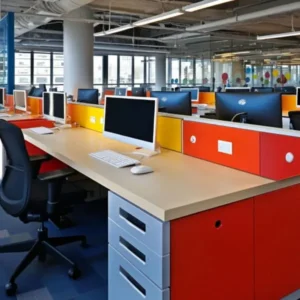 Contemporary corporate office setup with colorful workstation partitions